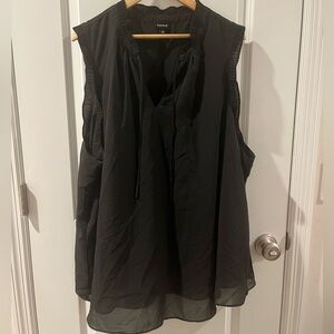 Torrid Black Sleeveless Blouse with ruffled embellishments.